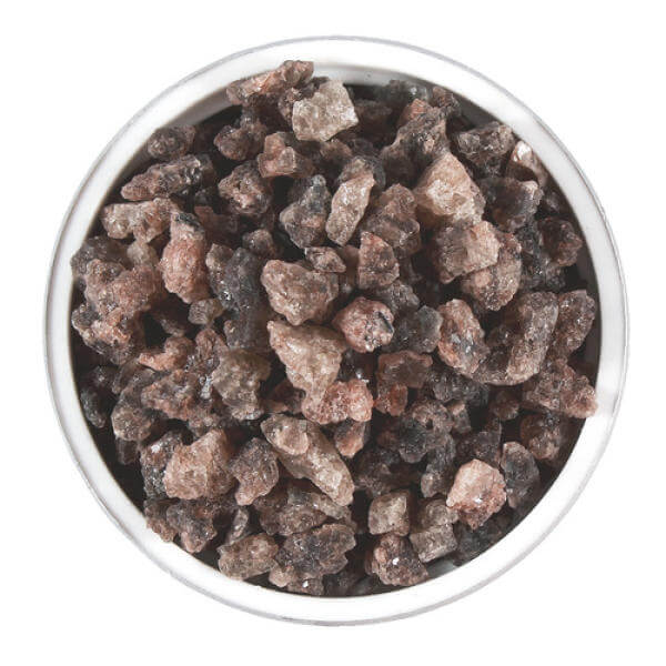 Bowl of INSAN Bamboo Salt Ultimate Purple 9X Roasted Crystal 60g, rich in essential minerals for health benefits.
